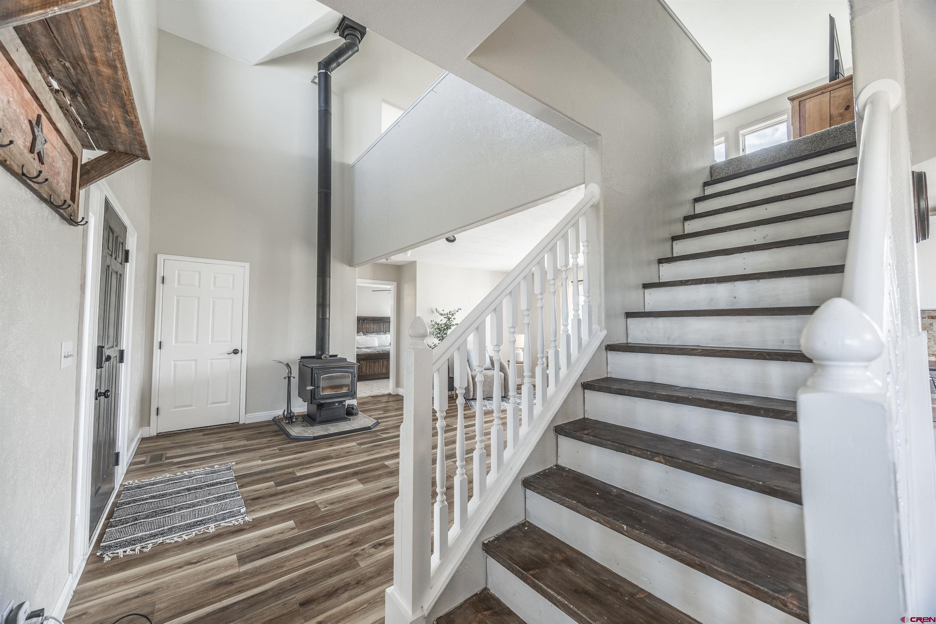 19555 6575th Road Montrose, CO 81403 - Photo 9 of 36 a view of entryway and hall with wooden floor