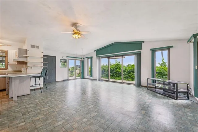 a view of workspace with furniture window and outside view