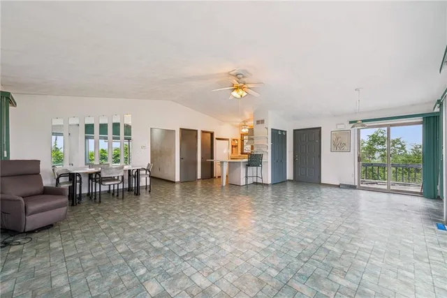 a view of livingroom with furniture and window