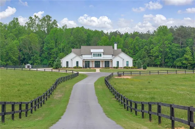 a view of a house with a big yard