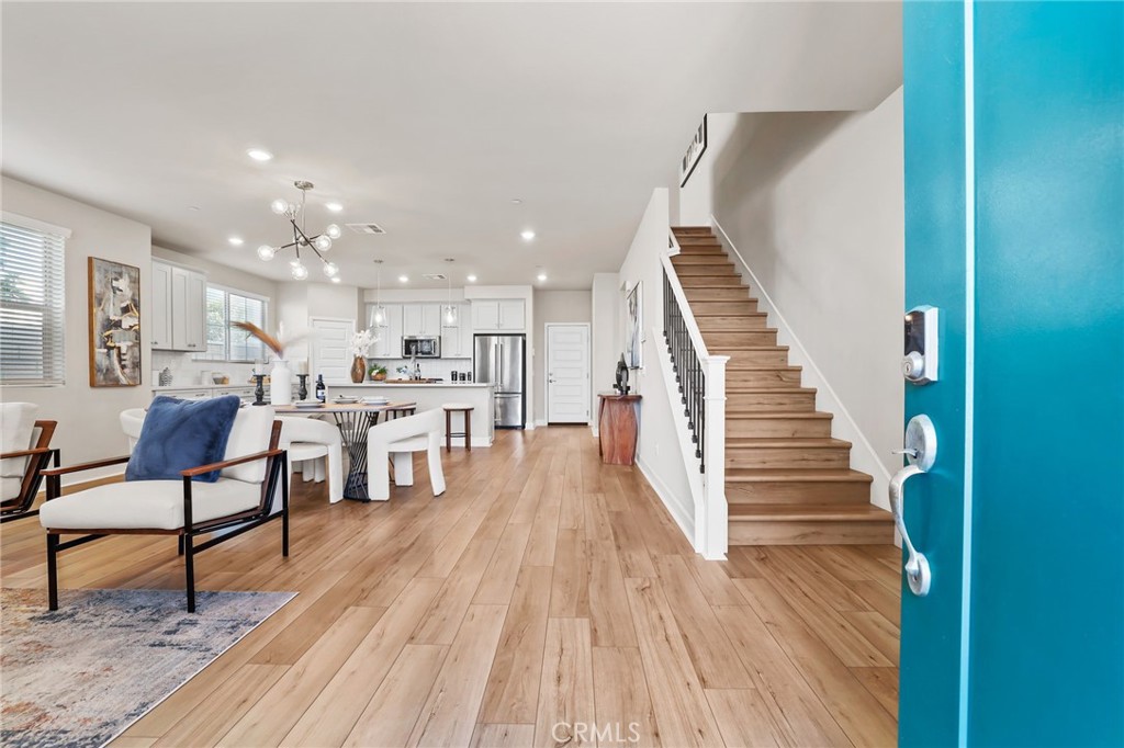 19091 Azul Lane Huntington Beach, CA 92648 - Photo 1 of 34 a living room with furniture and a wooden floor