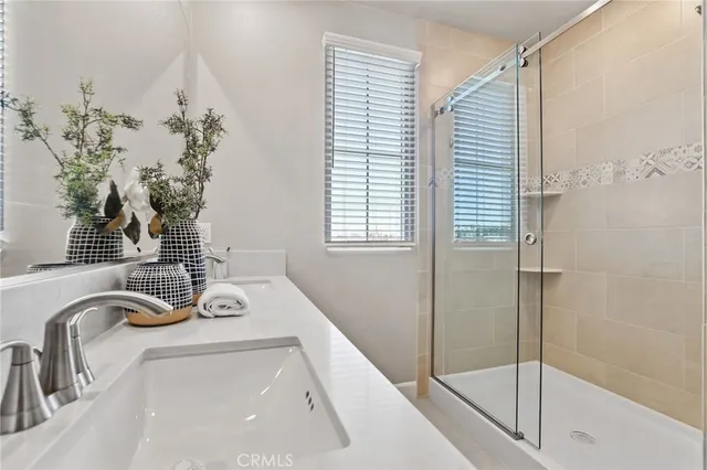 a bathroom with a bathtub and shower