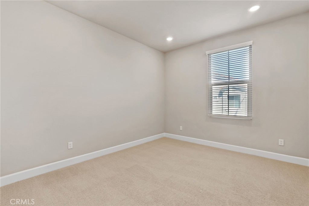 19091 Azul Lane Huntington Beach, CA 92648 - Photo 29 of 34 an empty room with a window