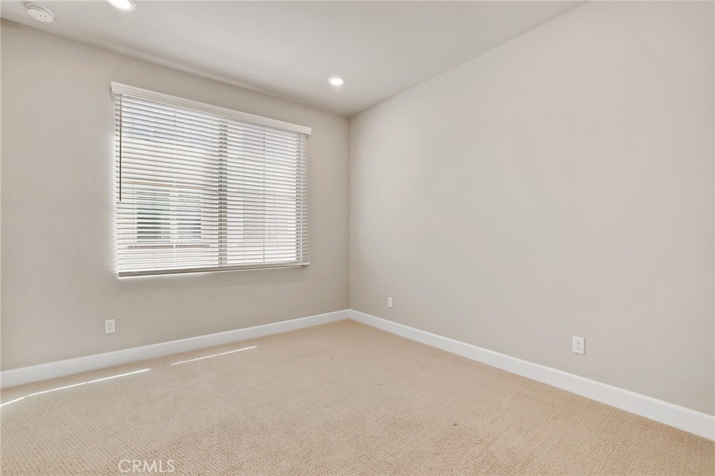 19091 Azul Lane Huntington Beach, CA 92648 - Photo 30 of 34 an empty room with a window