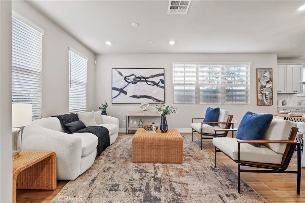 19091 Azul Lane Huntington Beach, CA 92648 - Photo 9 of 34 a living room with furniture and windows