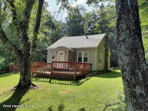 354 Sand Spring Road Cresco, PA 18326 - Photo 2 of 2 a view of a house with a yard balcony and a small yard