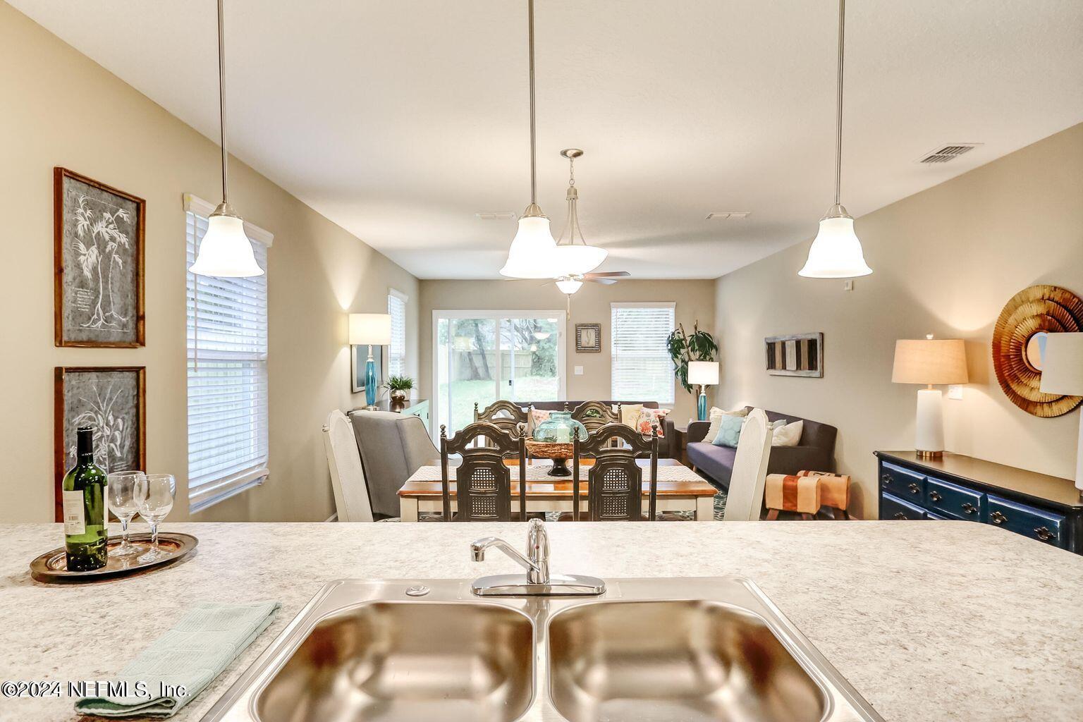 62 Clark Road Jacksonville, FL 32218 - Photo 9 of 13 kitchen to dining view