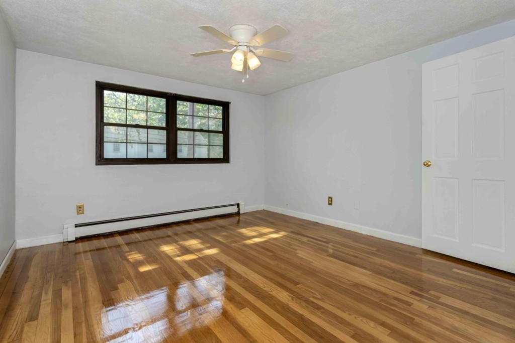 82 Renwick Road, Unit B Wakefield, MA 01880 - Photo 20 of 29 a view of an empty room with a window