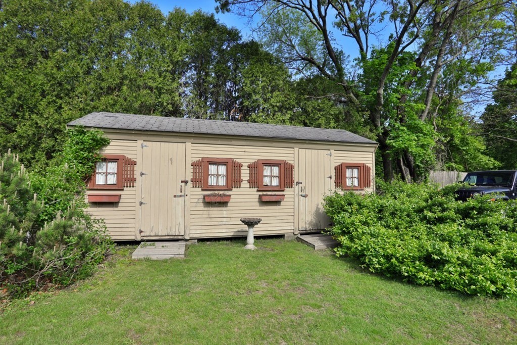 82 Renwick Road, Unit B Wakefield, MA 01880 - Photo 27 of 29 a view of a house with a yard