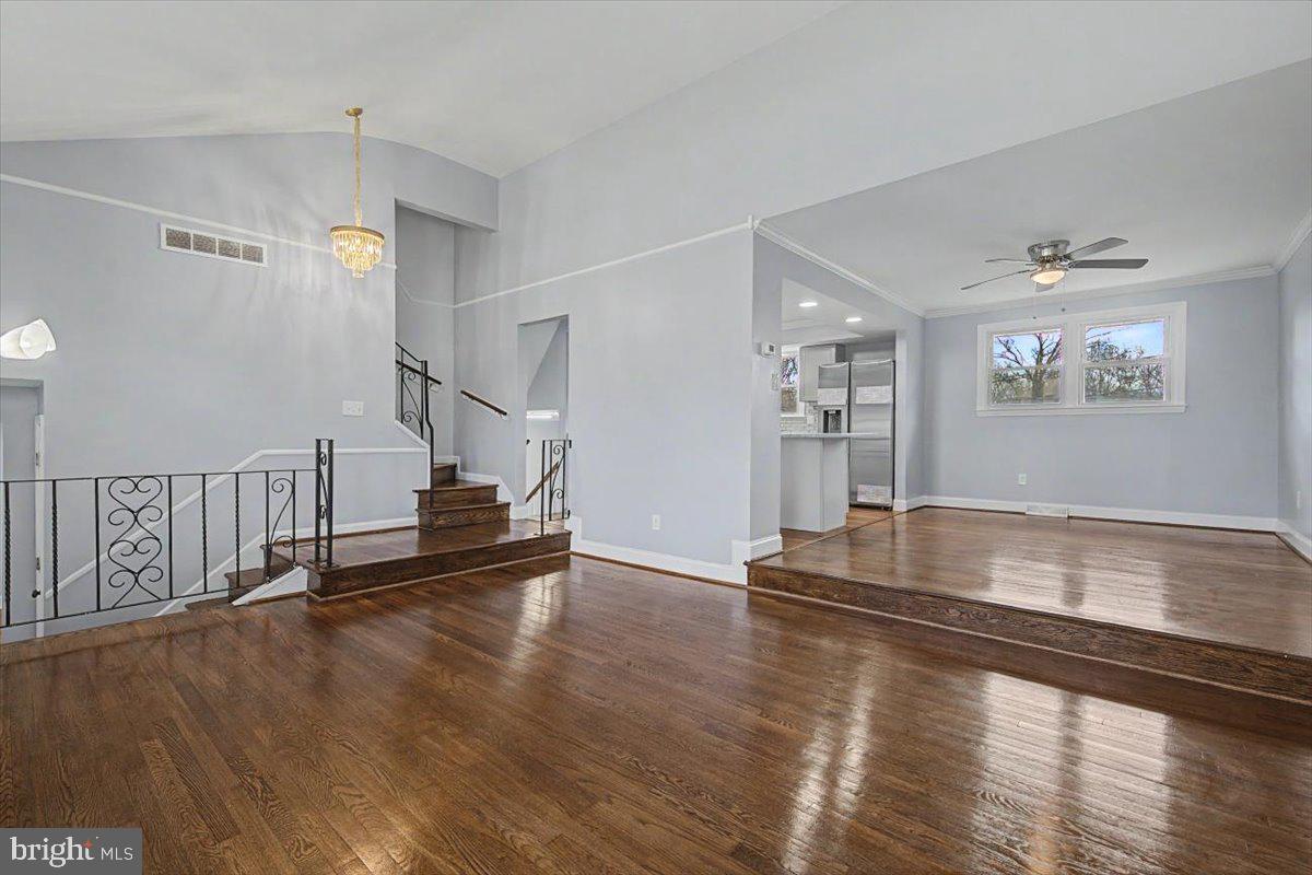 2209 Riviera Lane Wilmington, DE 19810 - Photo 15 of 43 a view of a room with wooden floor and staircase