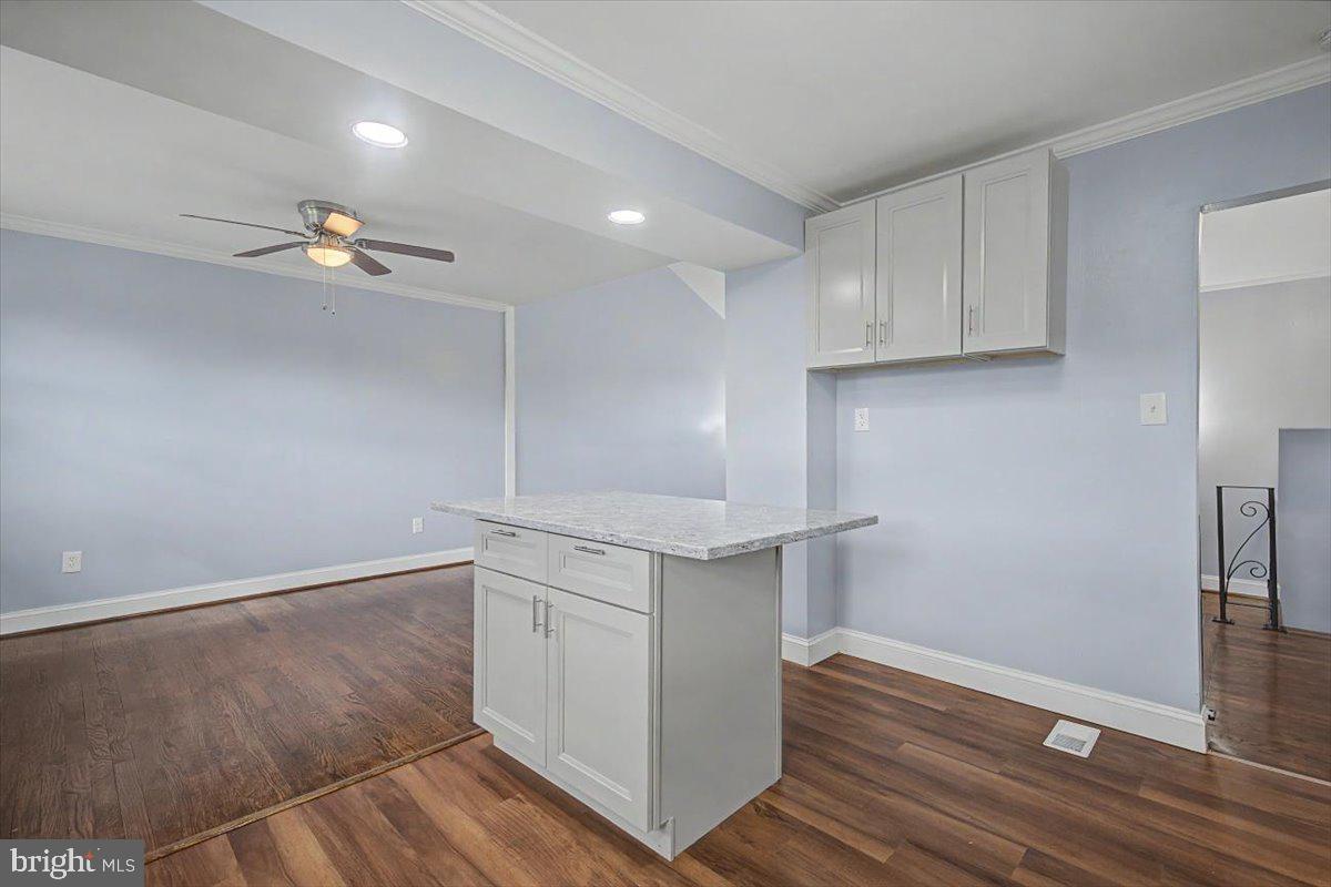 2209 Riviera Lane Wilmington, DE 19810 - Photo 20 of 43 a view of kitchen with cabinets and wooden floor