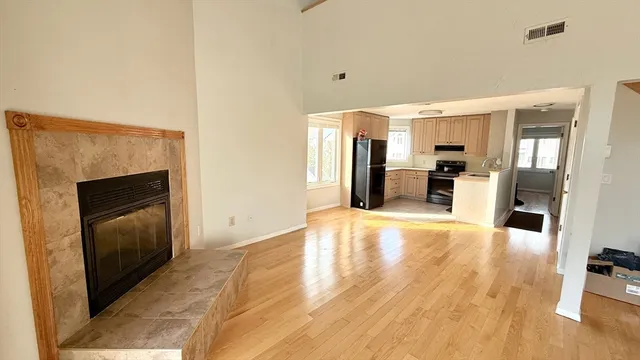 a view of a kitchen from the hallway