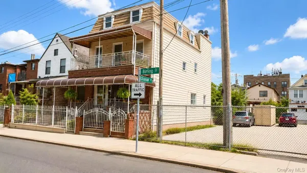 a front view of a house with street