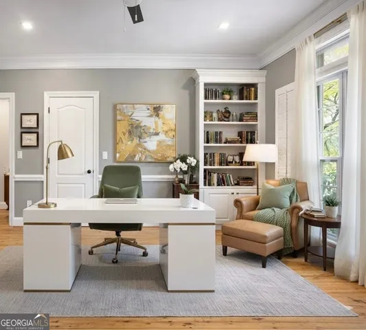 a view of an empty room with wooden walls