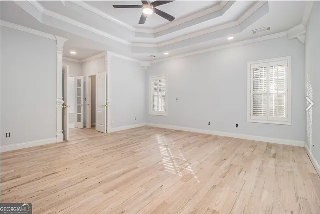 a view of a backyard with sitting area