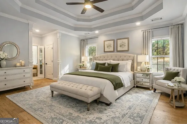 an aerial view of a houses with a lake view