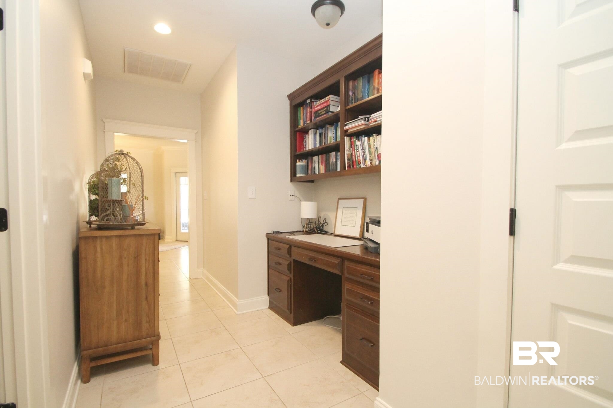 30232 Persimmon Drive Daphne, AL 36527 - Photo 18 of 27 Office area featuring light tile patterned floors, baseboards, visible vents, built in desk, and recessed lighting