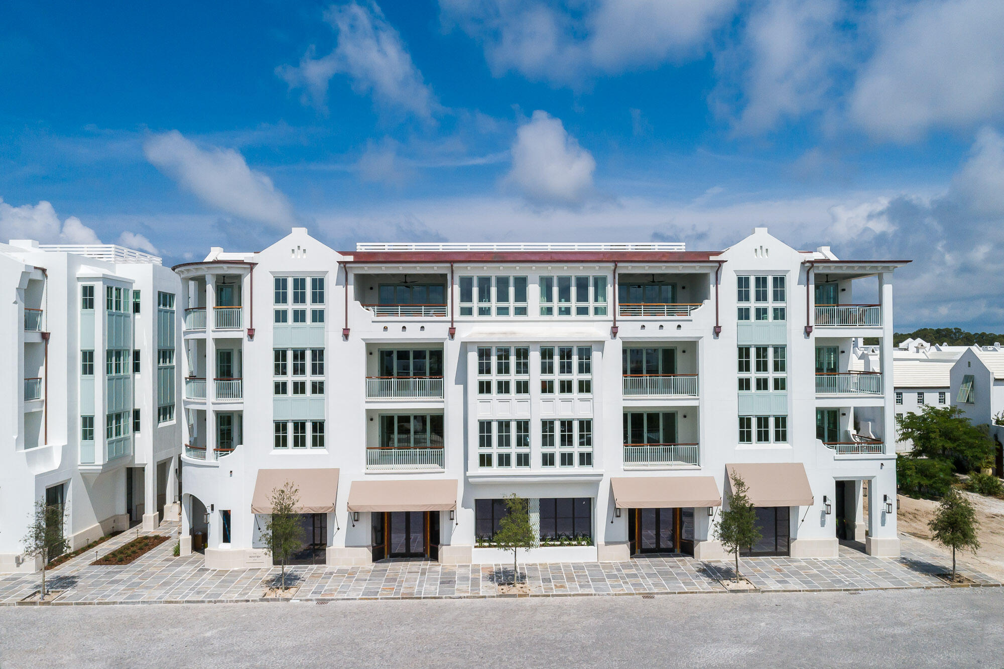 74 Governors Ct Inlet Beach, Unit W202 Inlet Beach, FL 32461 - Photo 3 of 29 a front view of a building with a street