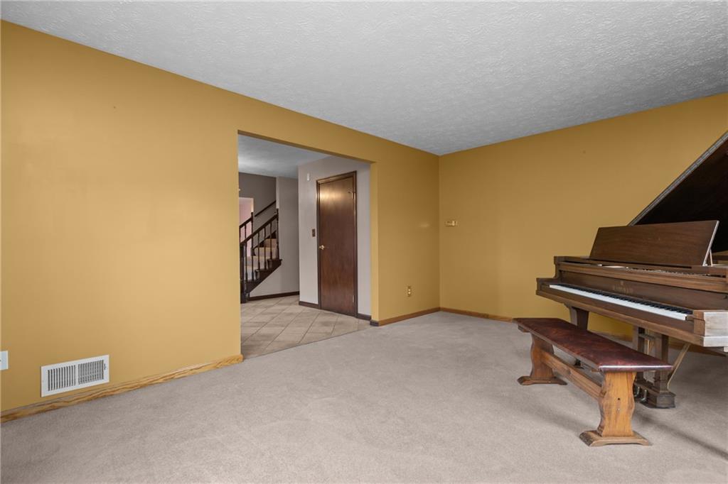 223 Balsinger Road Uniontown, PA 15401 - Photo 11 of 50 a view of an empty room with furniture and a window