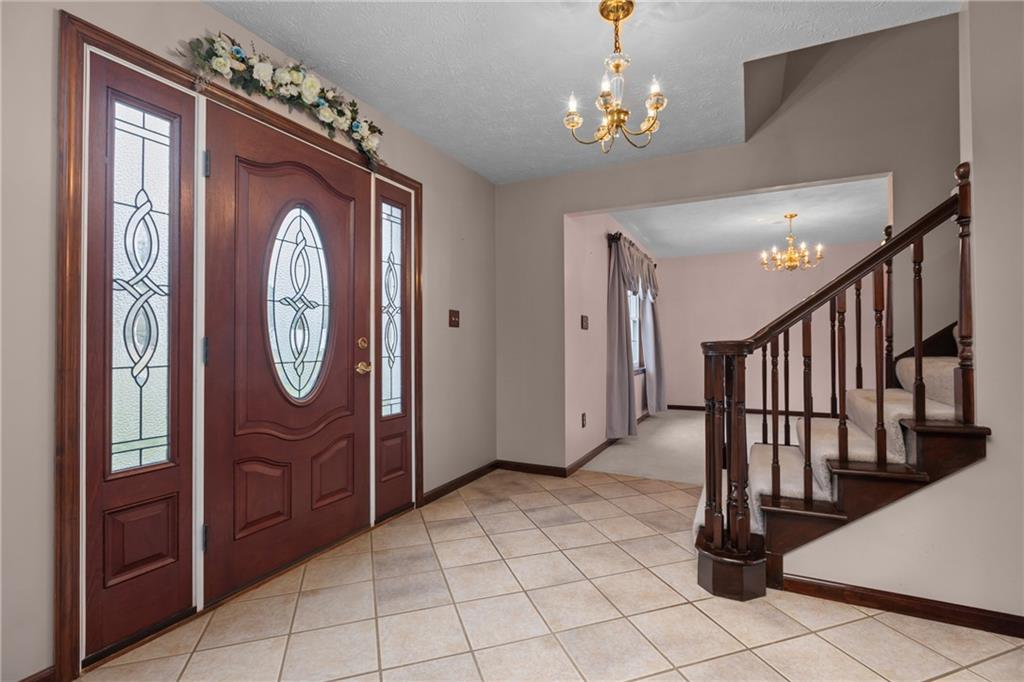 223 Balsinger Road Uniontown, PA 15401 - Photo 11 of 50 a view of a hallway with entryway closet and front door