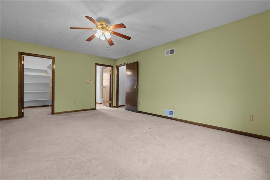 223 Balsinger Road Uniontown, PA 15401 - Photo 28 of 50 an empty room with closet and fan
