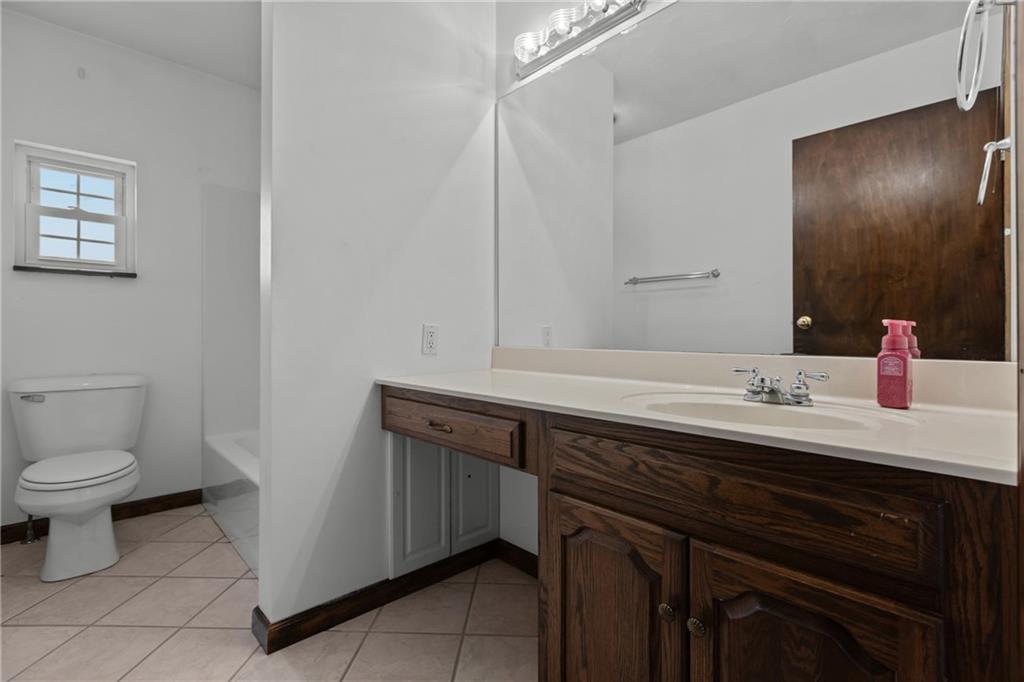 223 Balsinger Road Uniontown, PA 15401 - Photo 31 of 50 a bathroom with a sink and a toilet