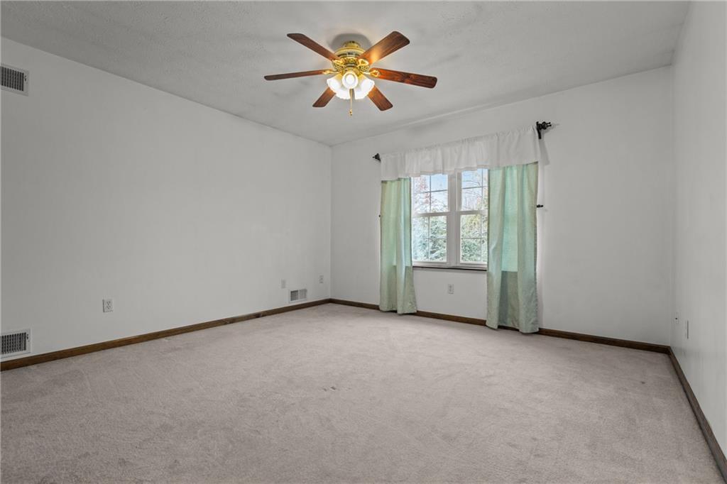 223 Balsinger Road Uniontown, PA 15401 - Photo 34 of 50 a view of an empty room with a window