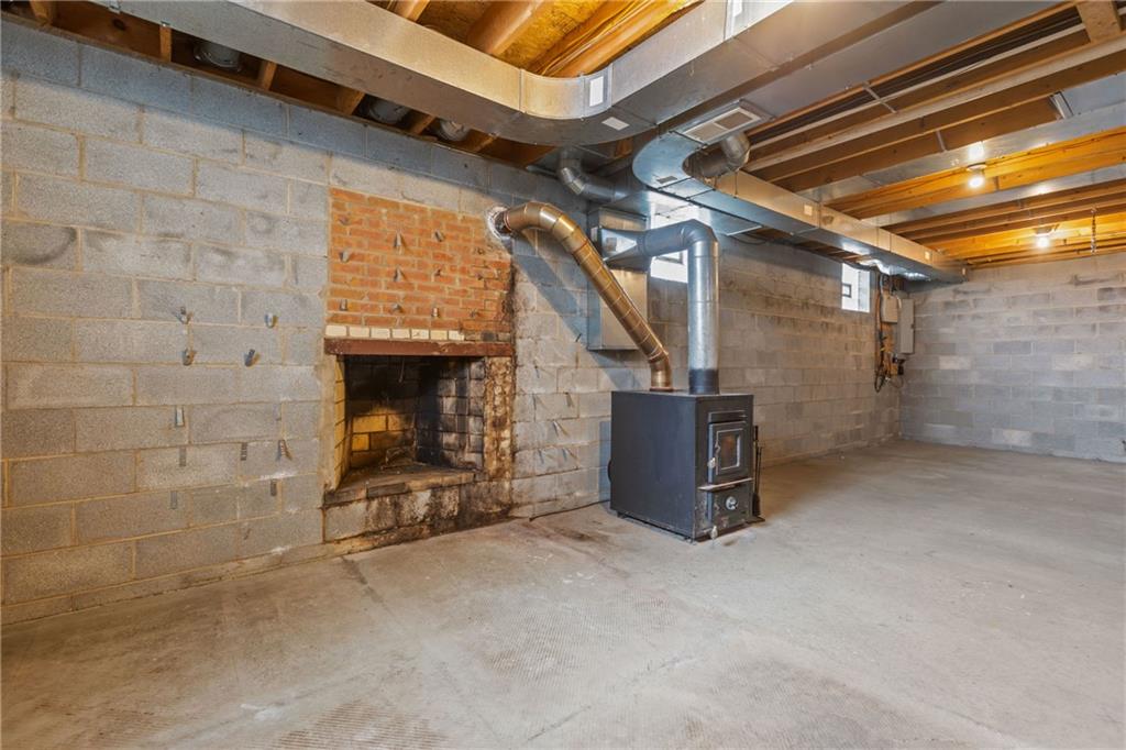 223 Balsinger Road Uniontown, PA 15401 - Photo 37 of 50 a view of an empty room with a fireplace