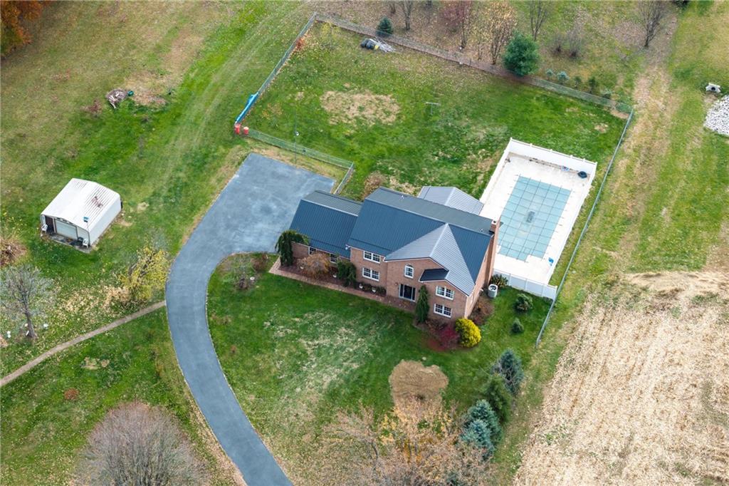 223 Balsinger Road Uniontown, PA 15401 - Photo 43 of 50 an aerial view of a house with a yard