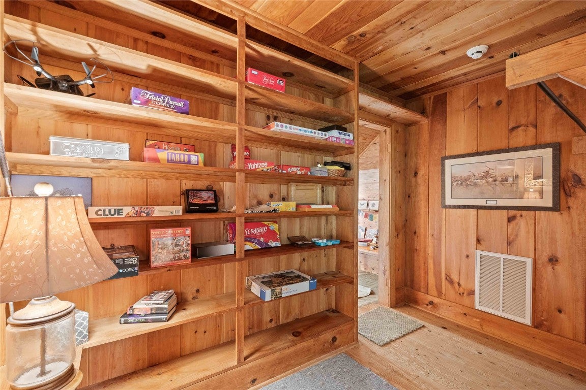 9134 Buck Creek Road Highlands, NC 28741 - Photo 26 of 53 Hall closet with built-ins for games, puzzles and books