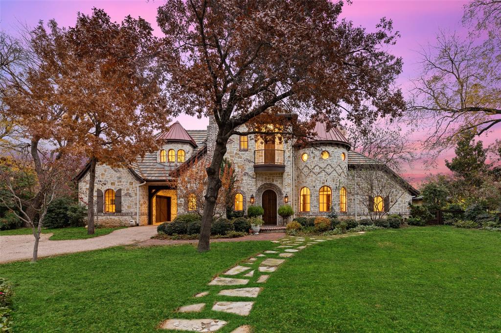 4800 Bluffview Boulevard Dallas, TX 75209 - Photo 1 of 33 a view of a building with a tree in front of it