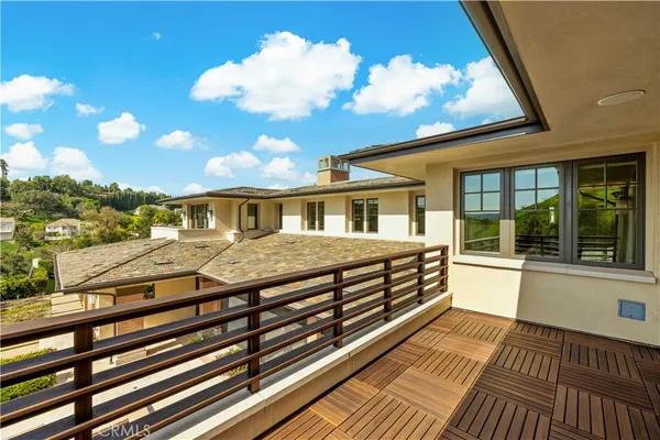 a front view of house with yard and outdoor seating