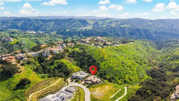 a living room with furniture and windows