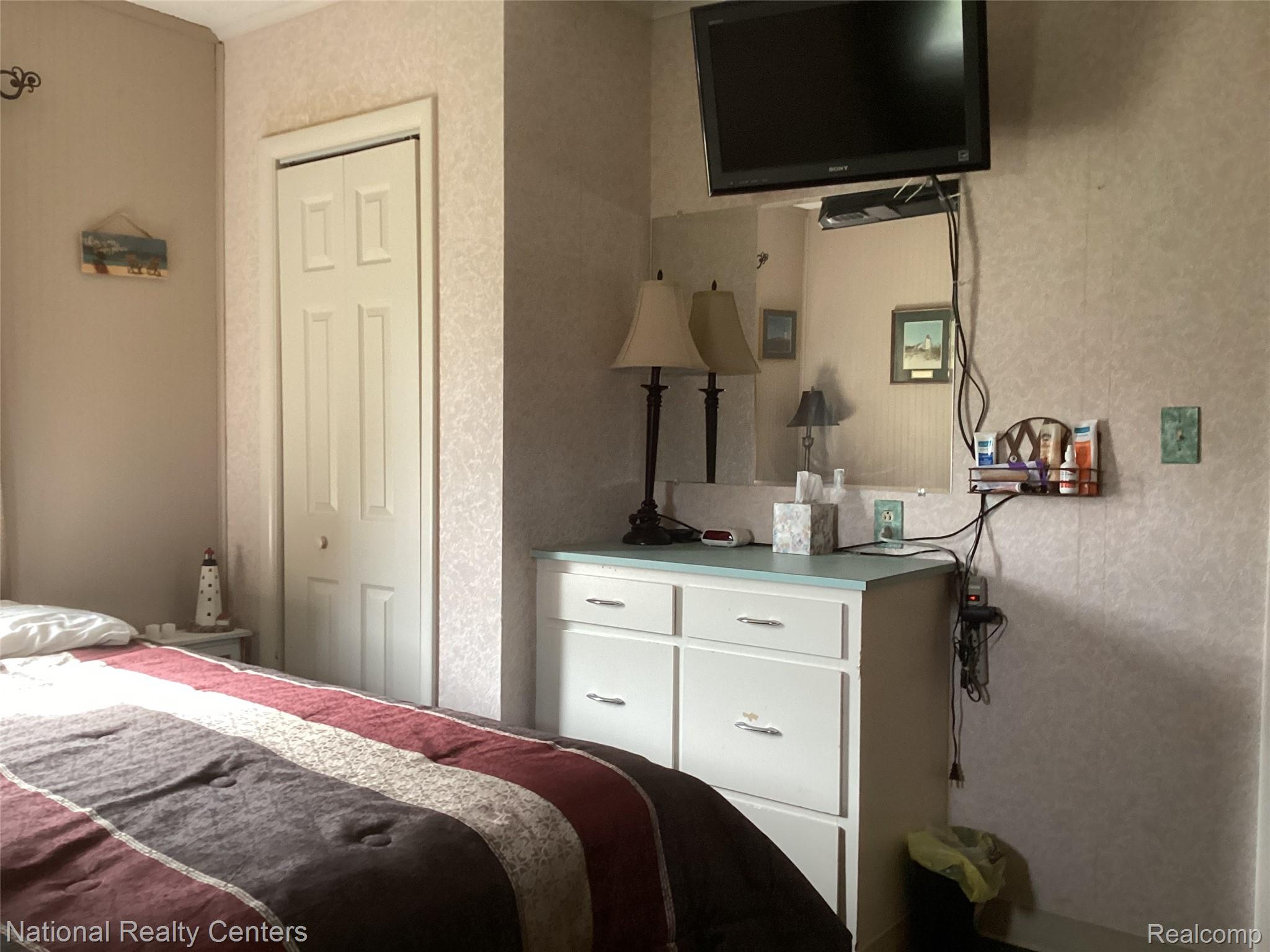 6024 Port Austin Road, Unit 5 Caseville, MI 48725 - Photo 17 of 56 Both bedrooms come complete with built in dressers