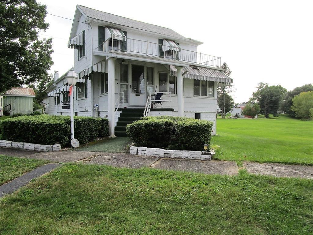 232 North Main Street Cambridge Springs, PA 16403 - Photo 2 of 23 a front view of a house with a yard