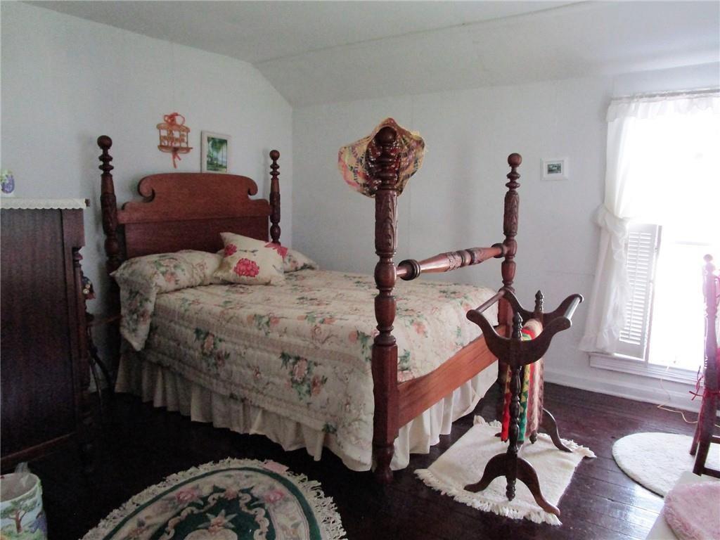 232 North Main Street Cambridge Springs, PA 16403 - Photo 17 of 23 a bedroom with a bed and large windows