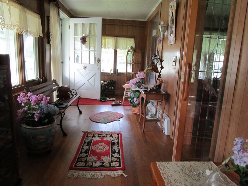 232 North Main Street Cambridge Springs, PA 16403 - Photo 6 of 23 a living room with furniture and a floor to ceiling window