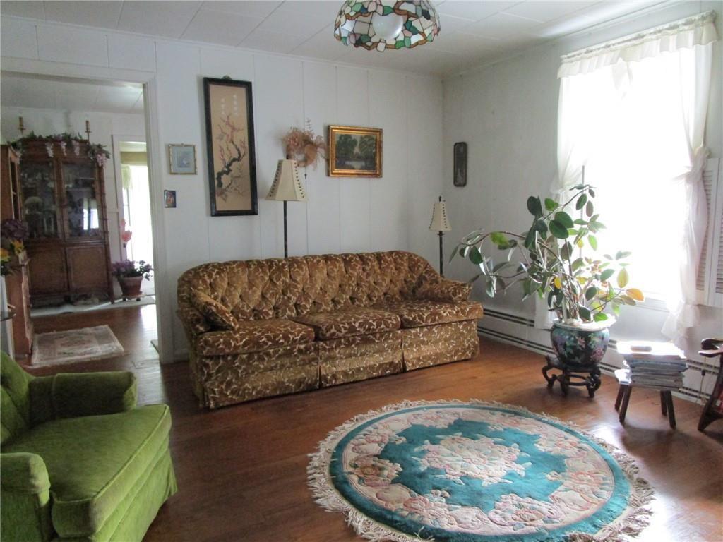 232 North Main Street Cambridge Springs, PA 16403 - Photo 7 of 23 a living room with furniture and a couch