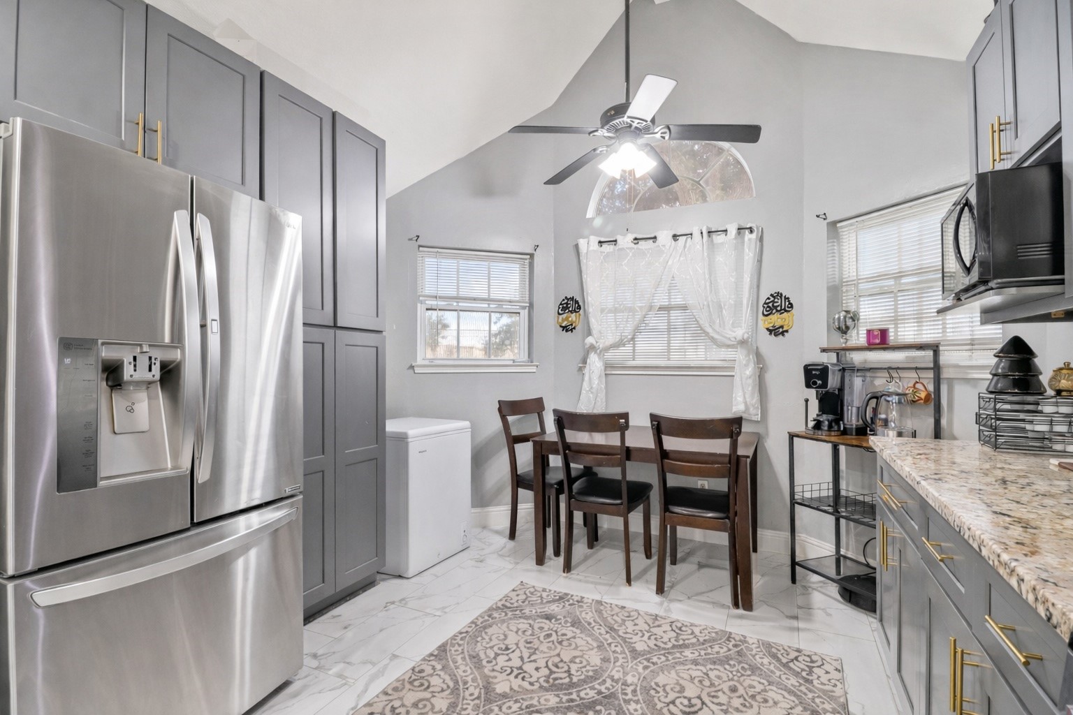 23027 Canal Road Richmond, TX 77406 - Photo 11 of 31 a view of a dining room with furniture window and wooden floor