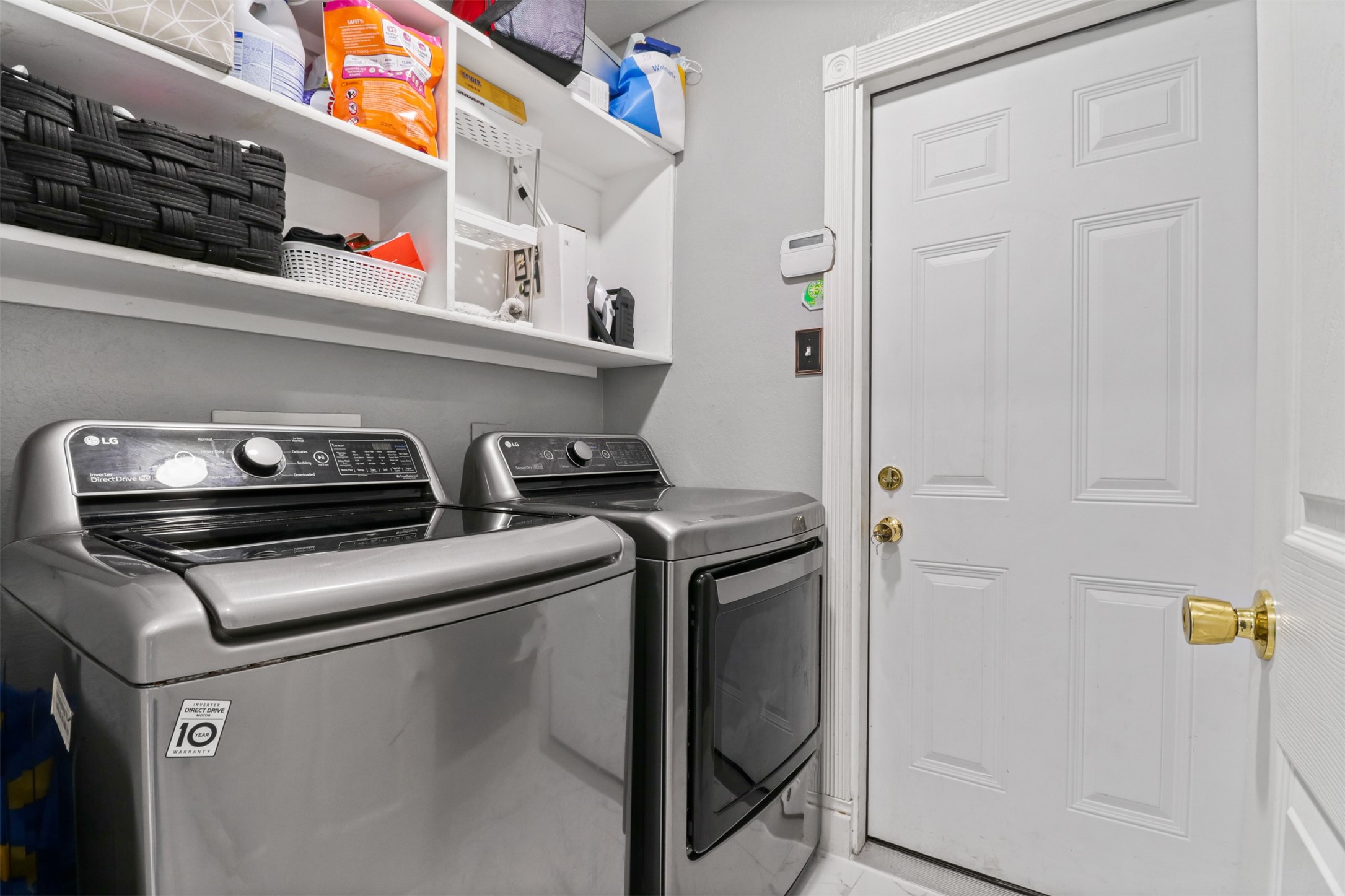 23027 Canal Road Richmond, TX 77406 - Photo 24 of 31 a utility room with dryer and washer