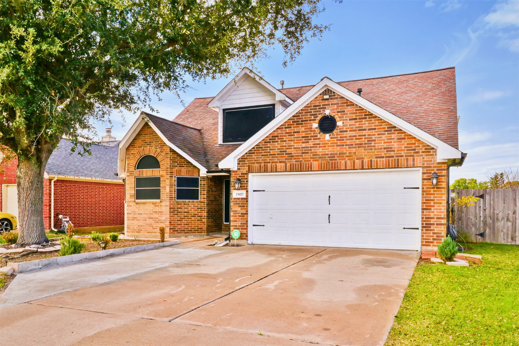 23027 Canal Road Richmond, TX 77406 - Photo 31 of 31 a view of a house with a yard
