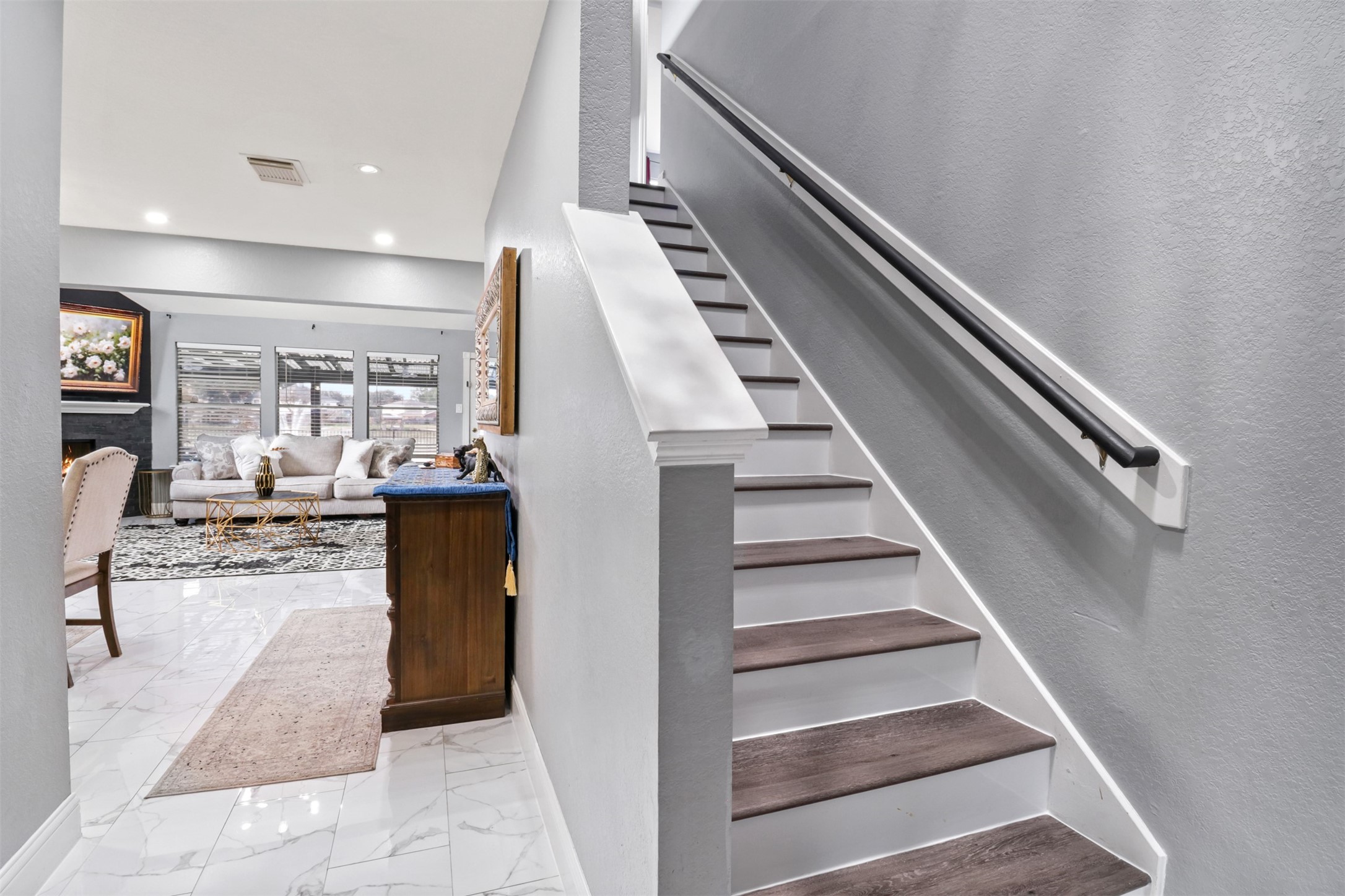 23027 Canal Road Richmond, TX 77406 - Photo 5 of 31 a view of staircase with living room