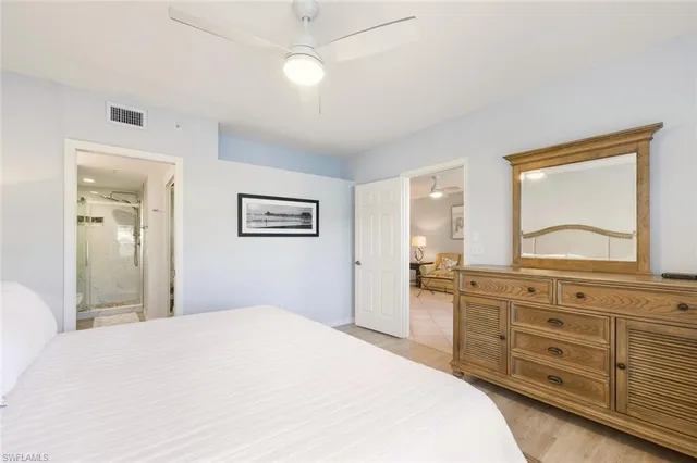 a view of a swimming pool with a lawn chairs