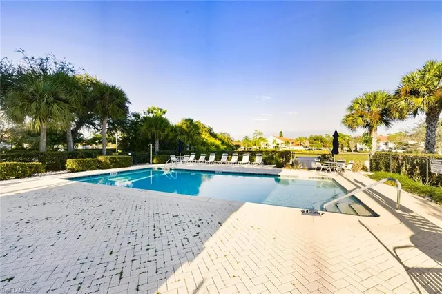 a view of a lake with a building in the background