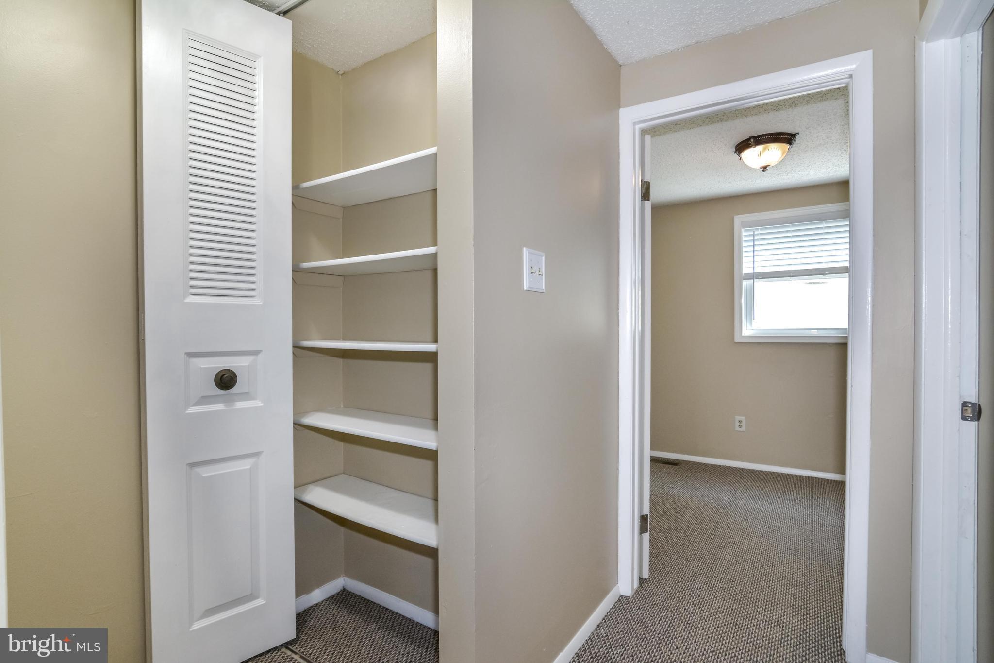 8609 Spring Creek Court Springfield, VA 22153 - Photo 6 of 30 a view of an entryway with wooden floor