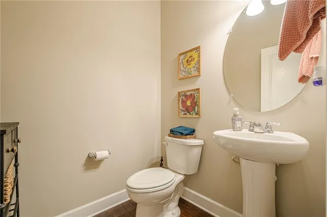 a view of a bathroom with a shower and a window