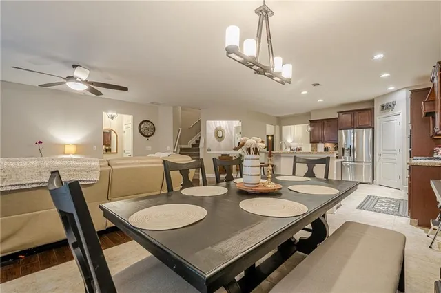a living room with furniture fireplace and flat screen tv