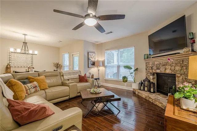 a bedroom with a bed and a television