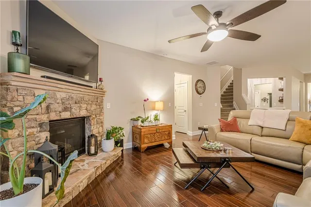 a bedroom with a large bed and a tv