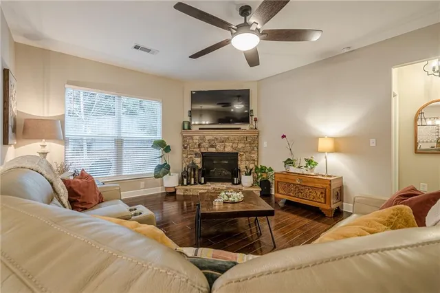 a view of walk in closet with clothes
